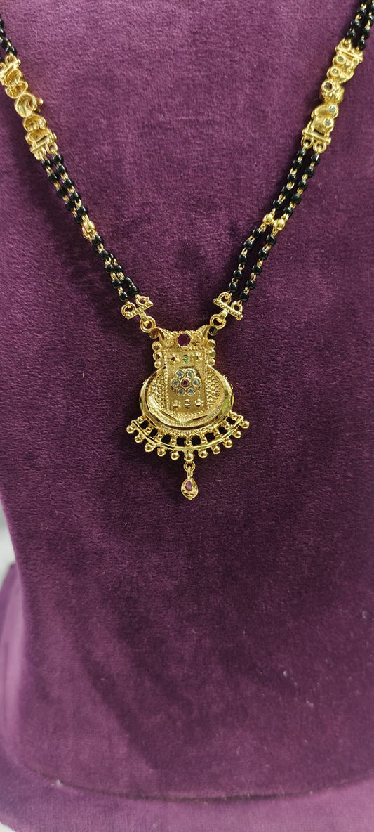 100% gold look black beads