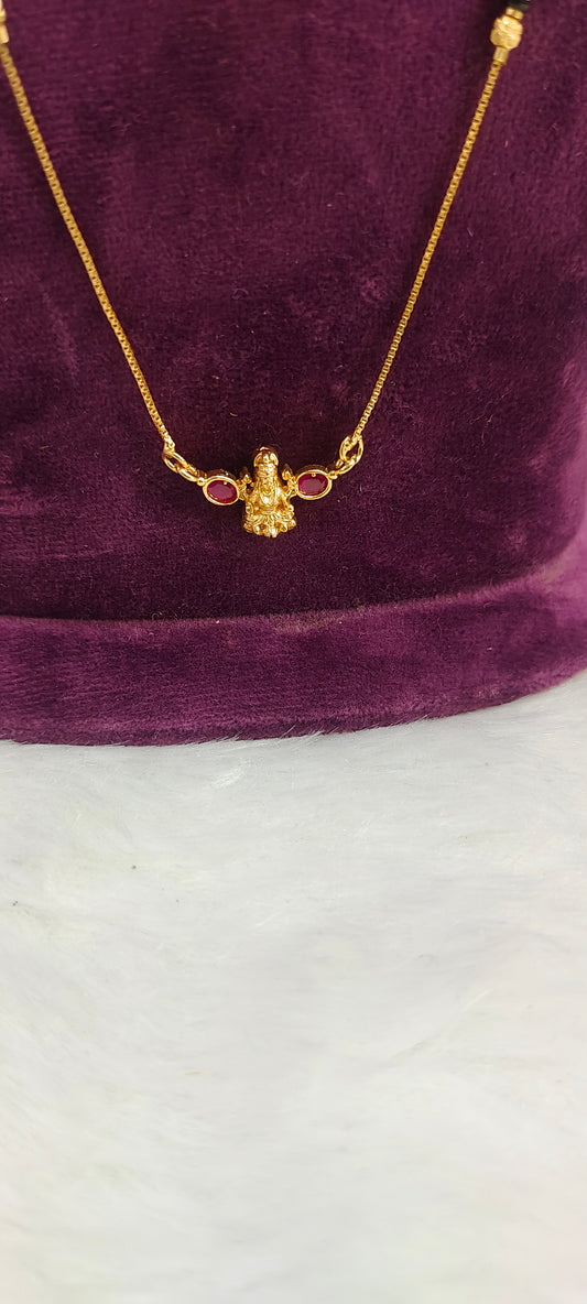 Gold look invisible 18" length black beads