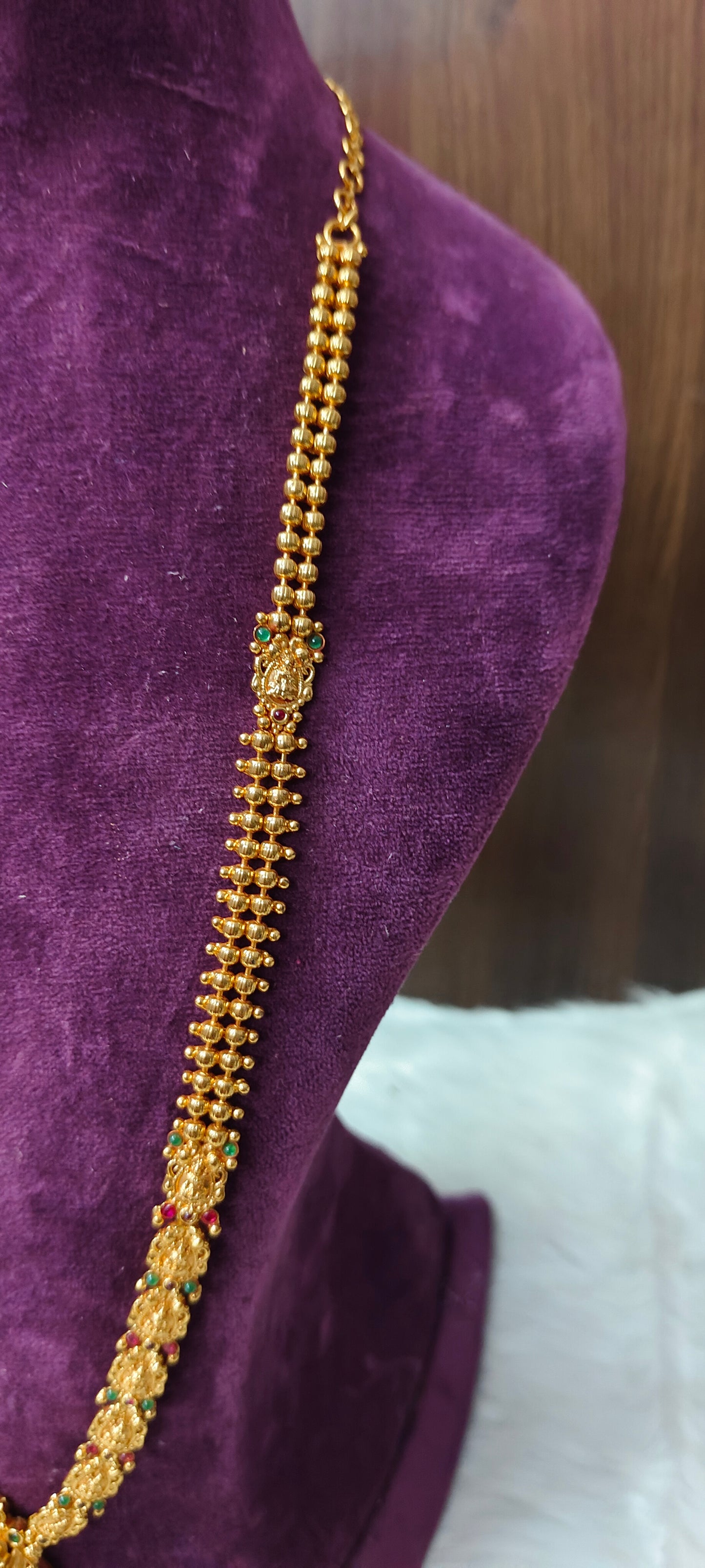 Simple long haram with Lakshmi Devi pendant