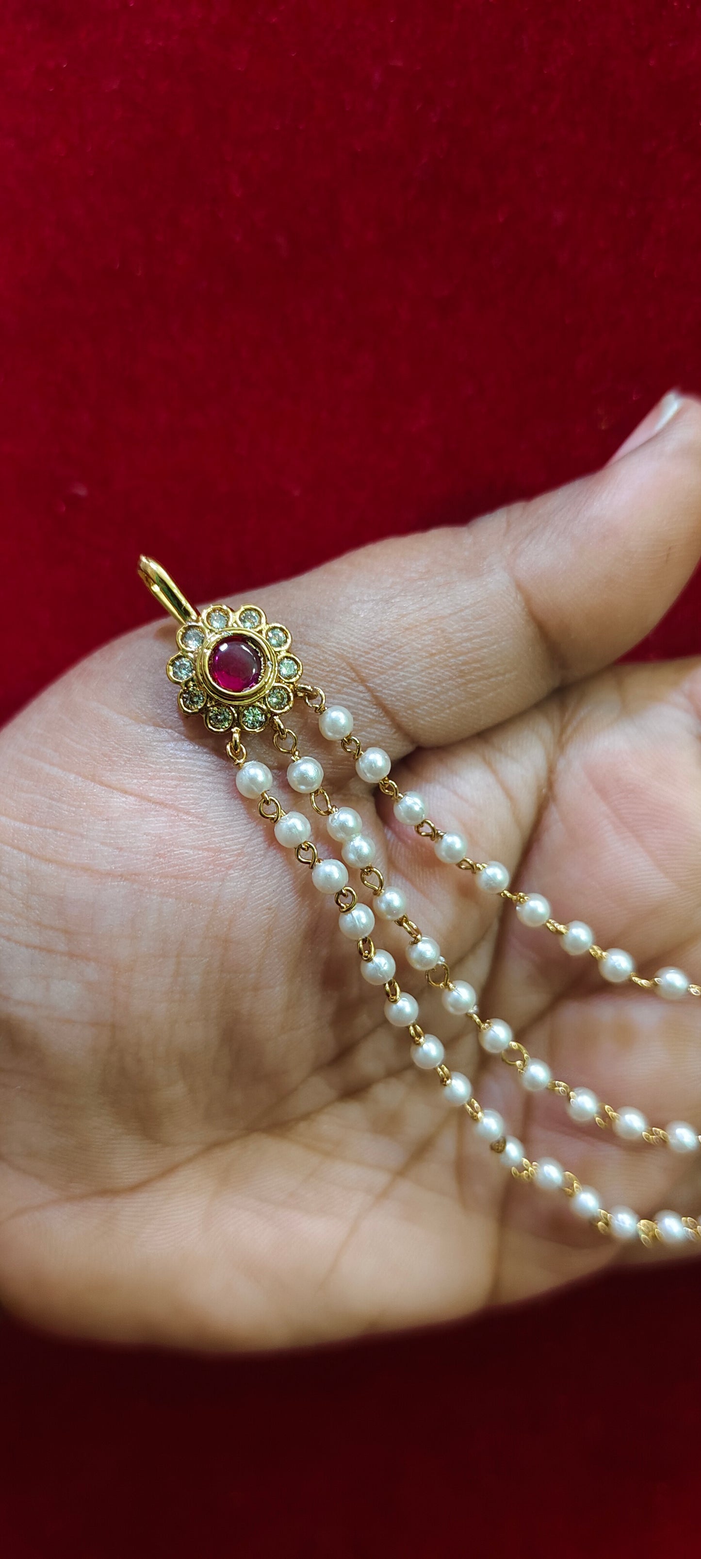Premium gold look pearl butta with attached ear chains