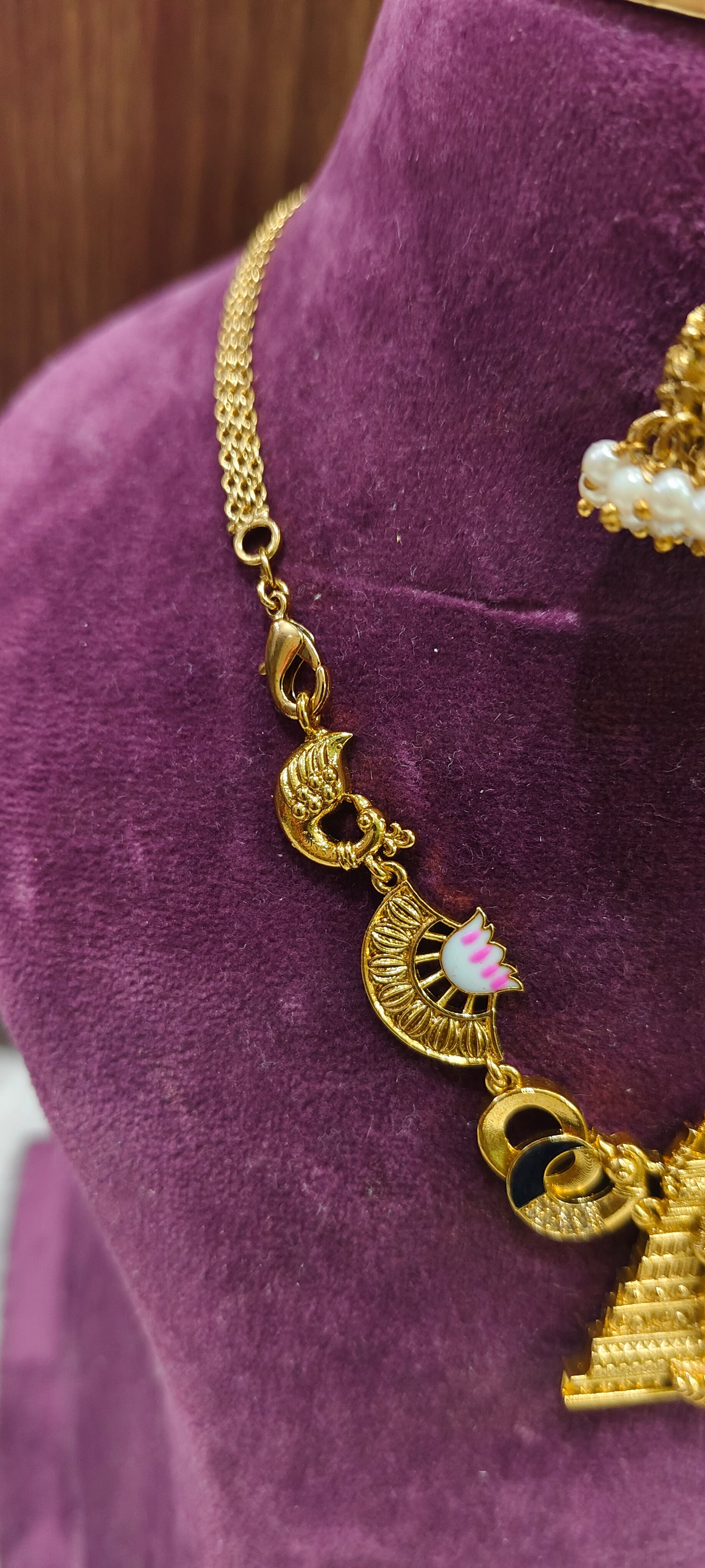 Premium gold look temple jewellery with meenakari design