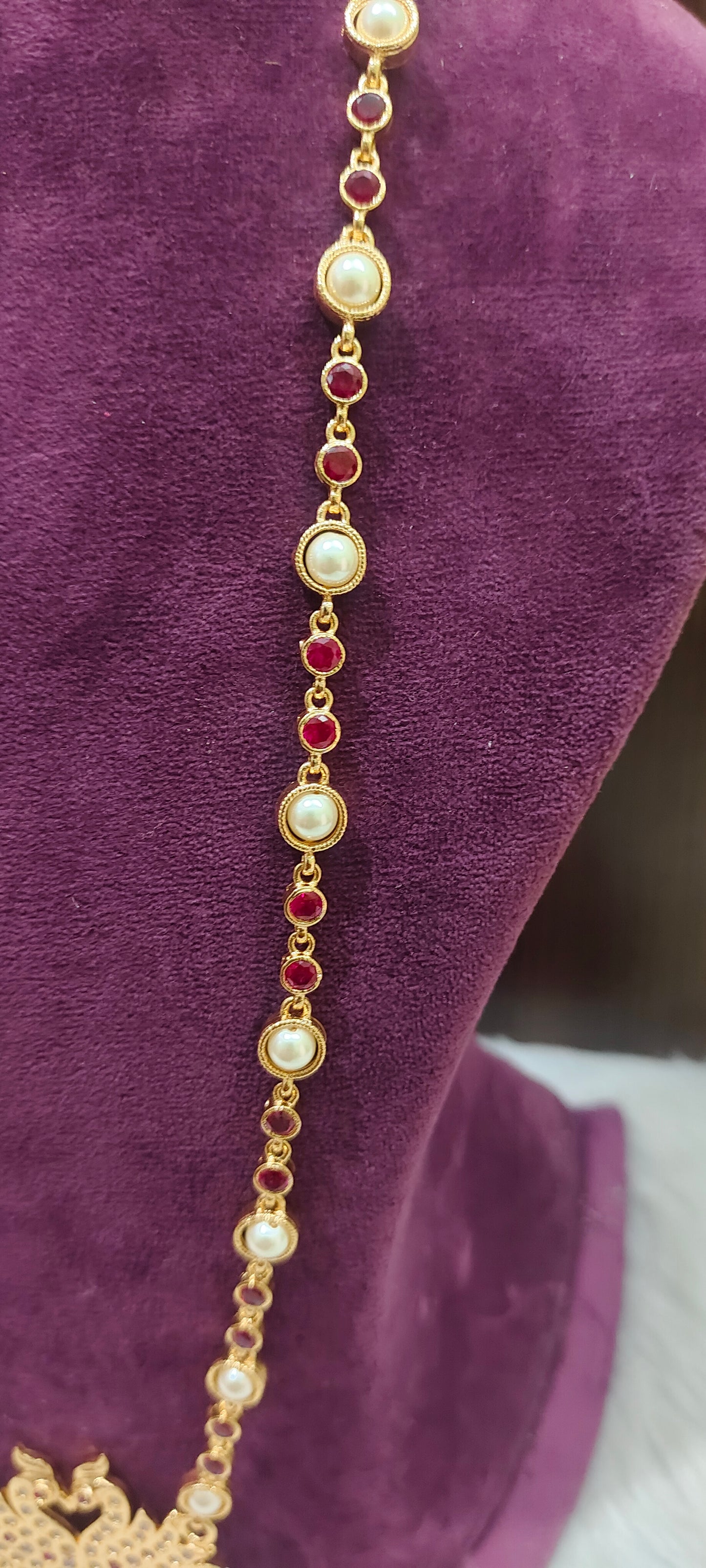 Pure panchaloham double swam pendent long haram with ruby stones