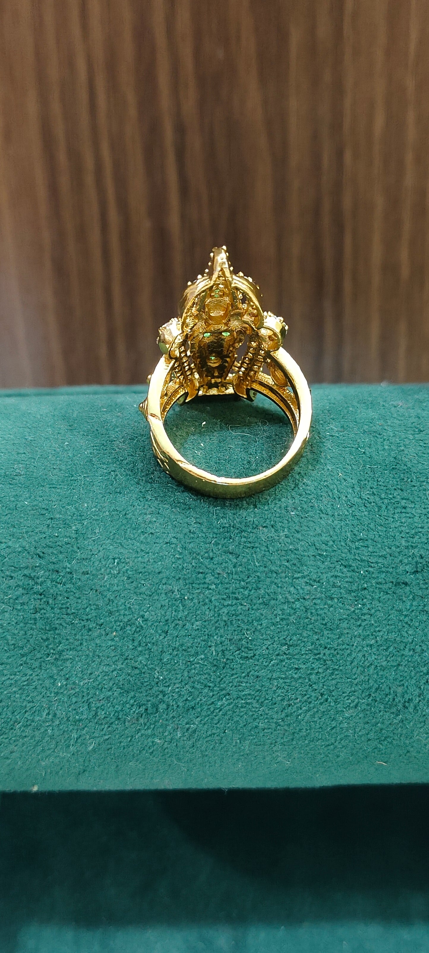 Premium stone based gold look govinda raja swami finger ring