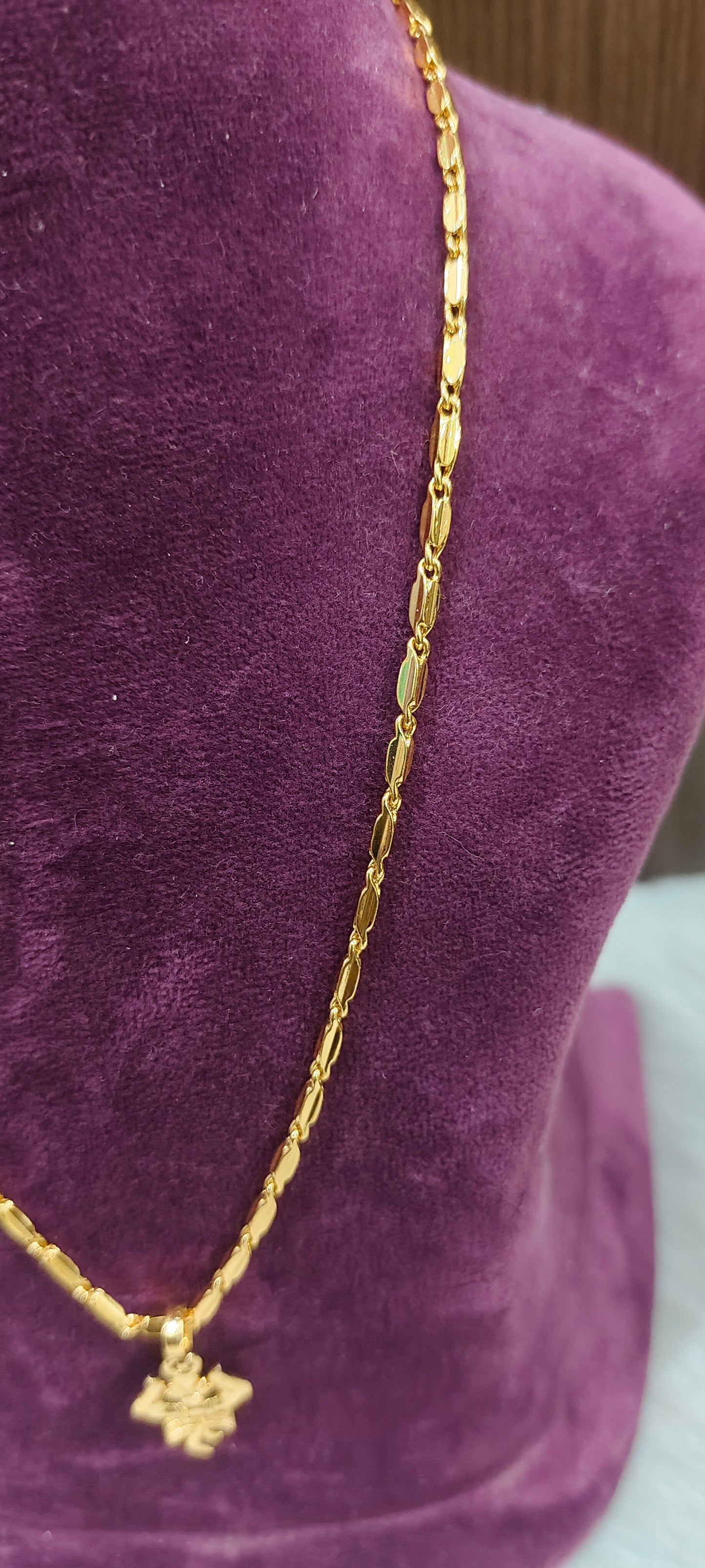 Premium micro gold plated 18" length trisul locket with rice model chain