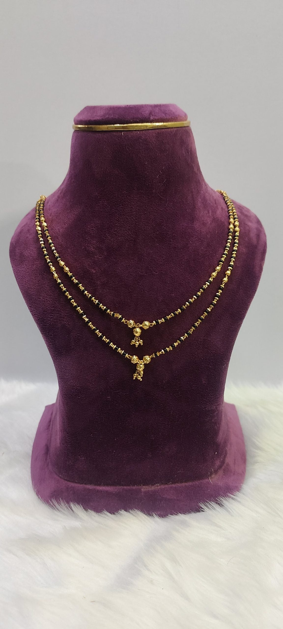 1gram plated 2 line black beads