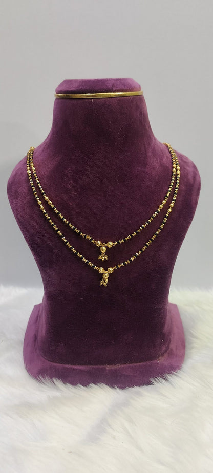 1gram plated 2 line black beads