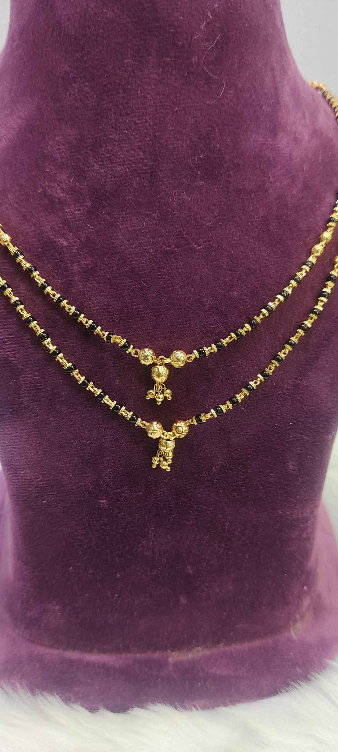 1gram plated 2 line black beads