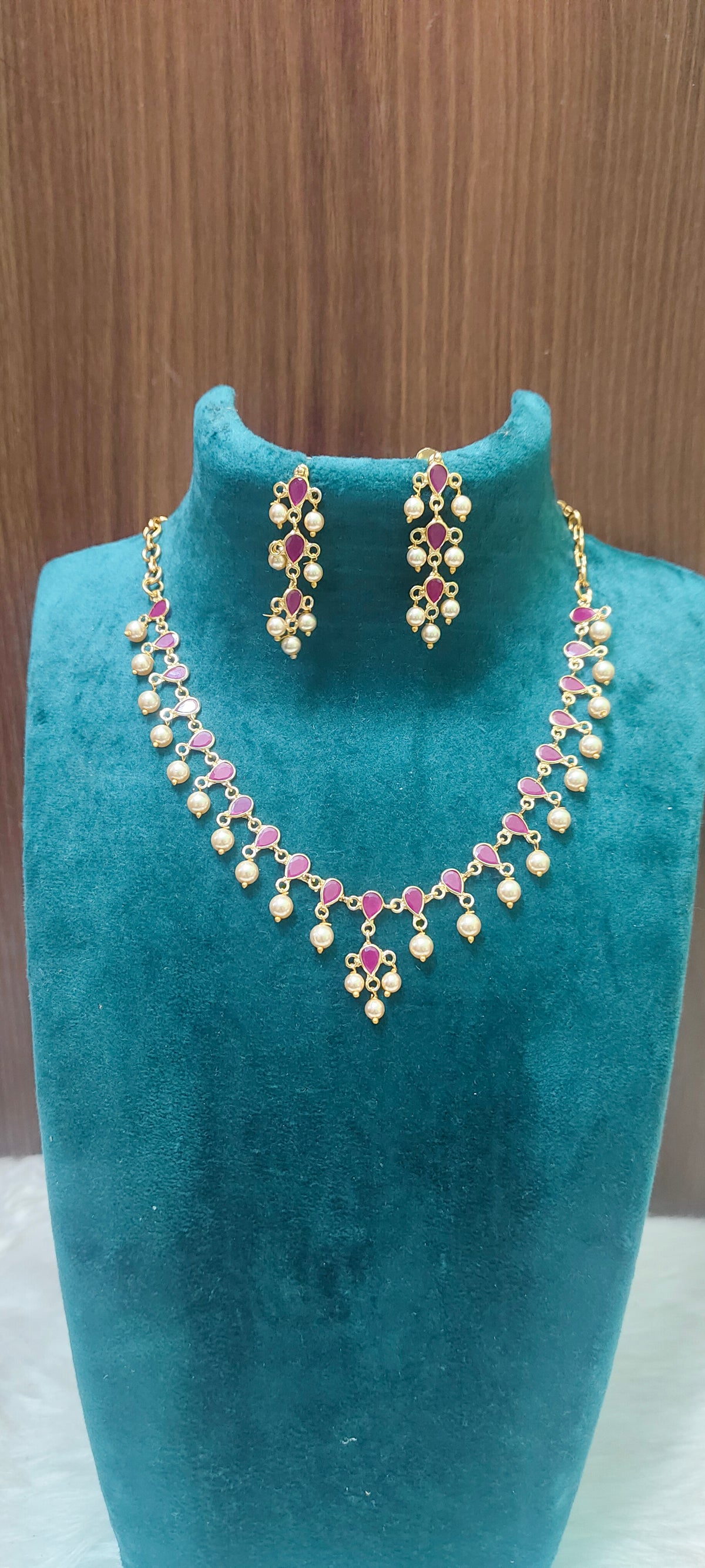 Premium gold look polki necklace and  earrings with bomby screw