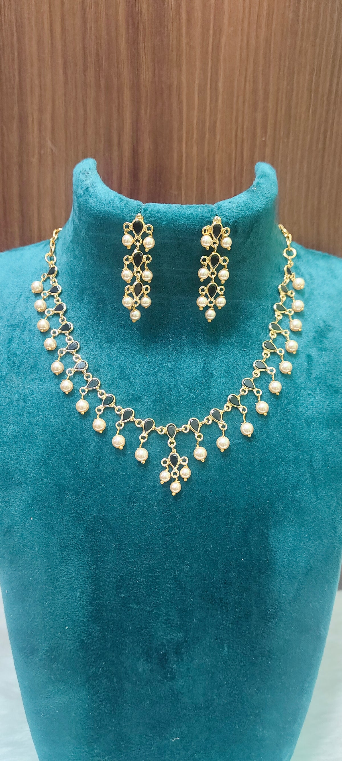 Premium gold look polki necklace and  earrings with bomby screw