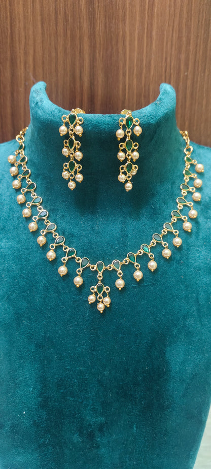 Premium gold look polki necklace and  earrings with bomby screw
