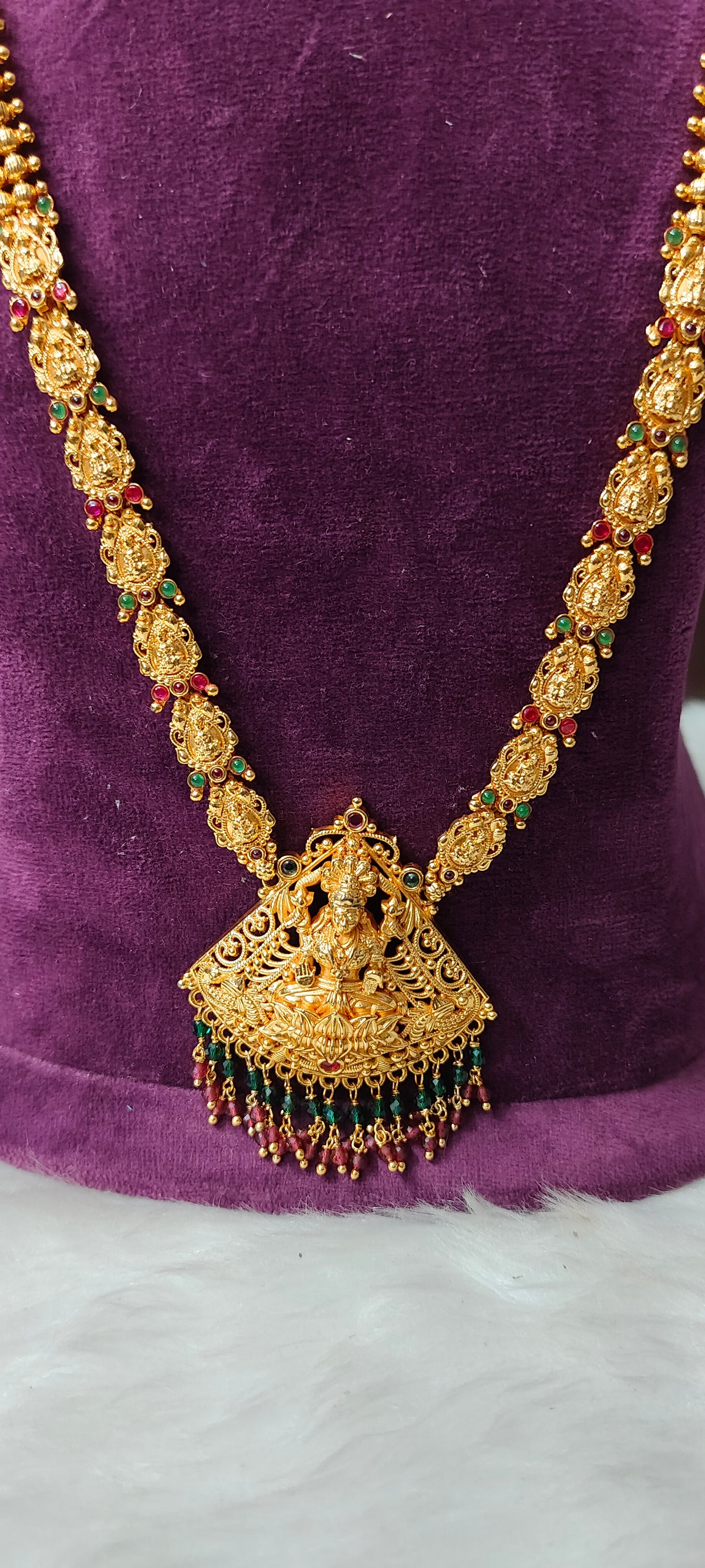 Simple long haram with Lakshmi Devi pendant