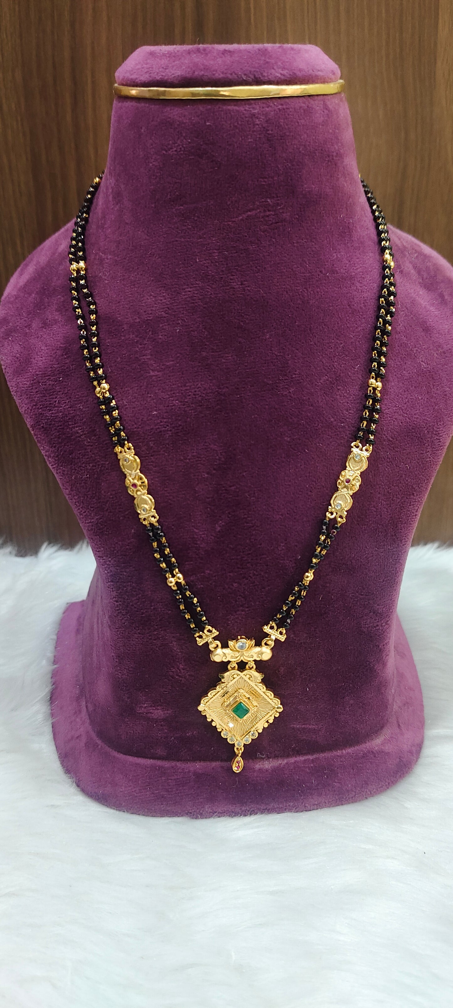 100% gold look 22" length 2 line black beads