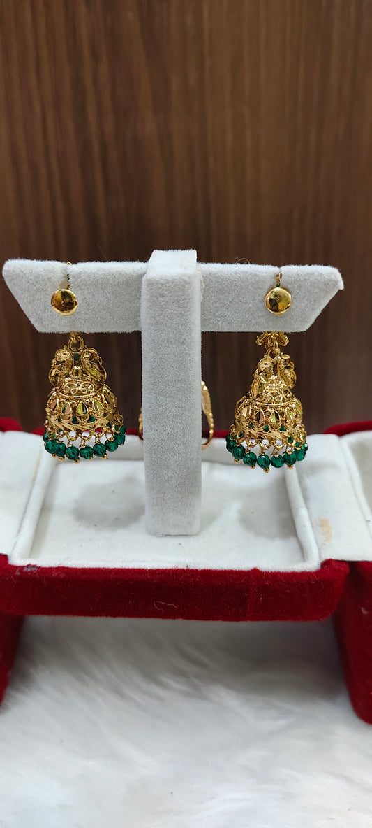 Stunning gold look jumkas and vanki ring combo
