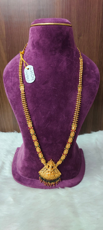 Simple long haram with Lakshmi Devi pendant