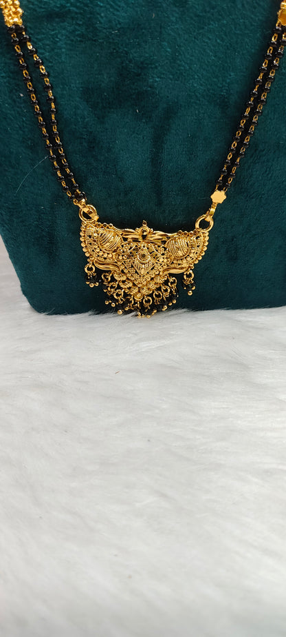 Premium gold look 3 set combo( black beads 28" length,jumkas, bangles)