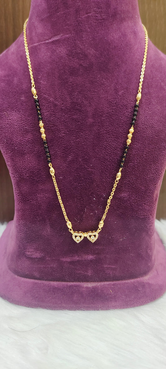 100% gold 18" length short black beads