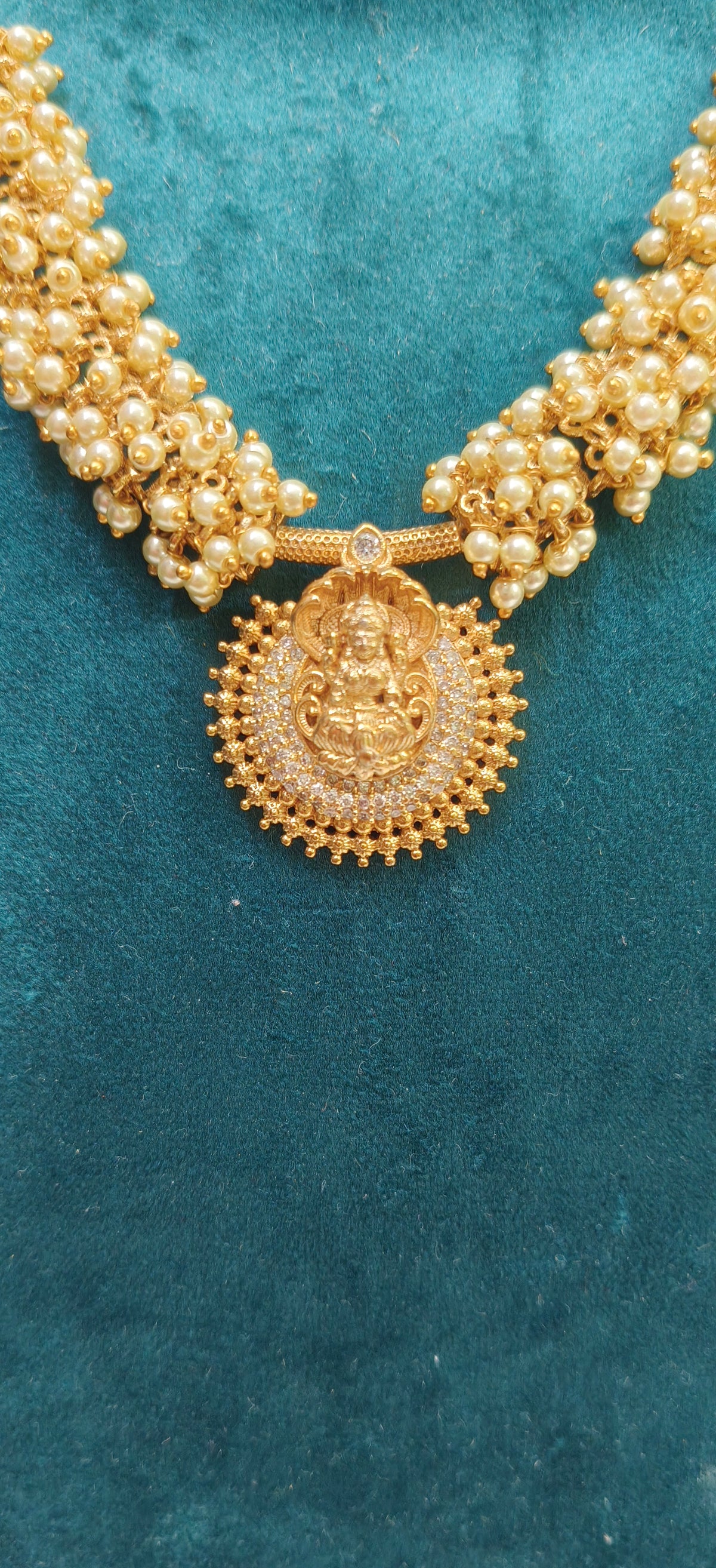 Simple and elegant pearl lakshmi Devi necklace set