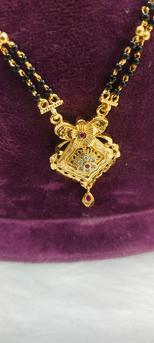 100% gold look 22" length 2 line black beads