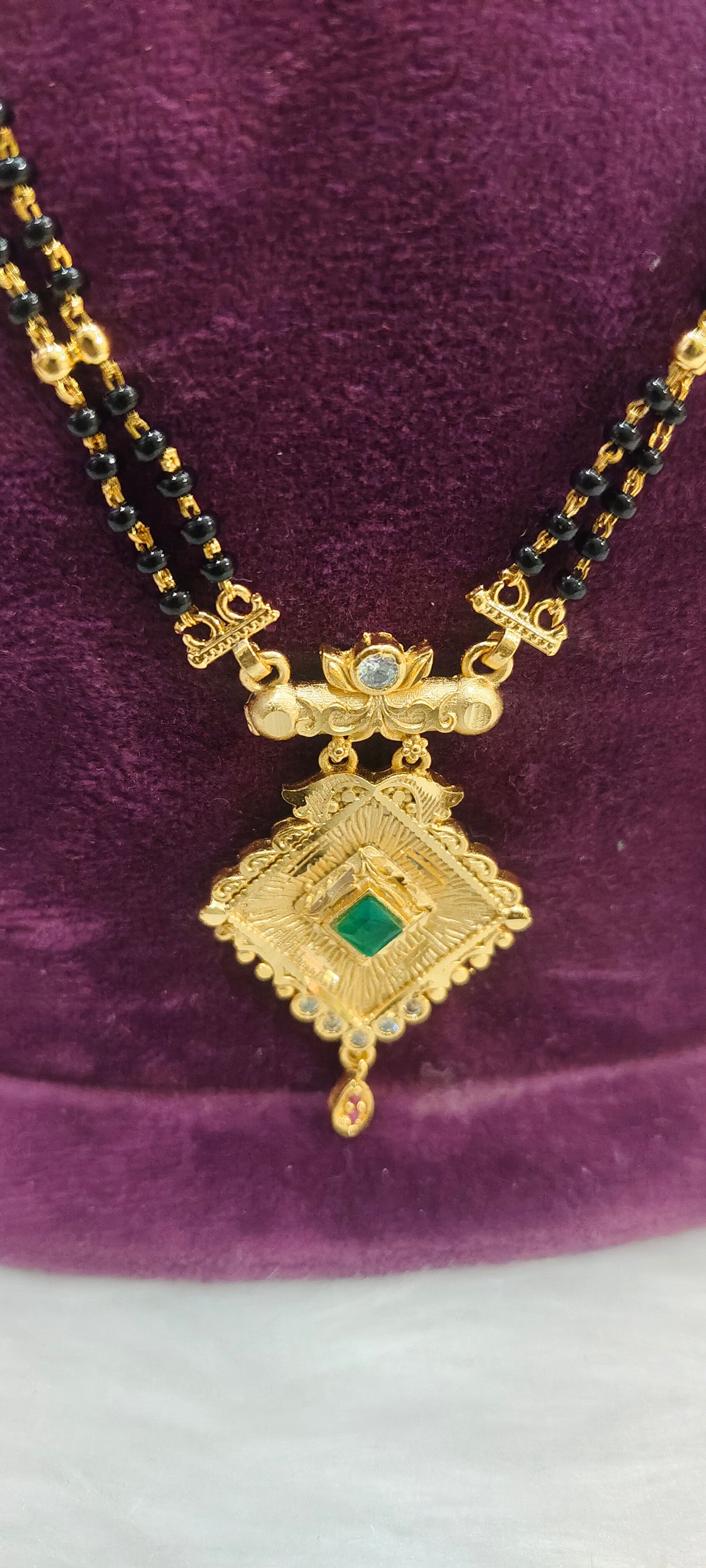 100% gold look 22" length 2 line black beads