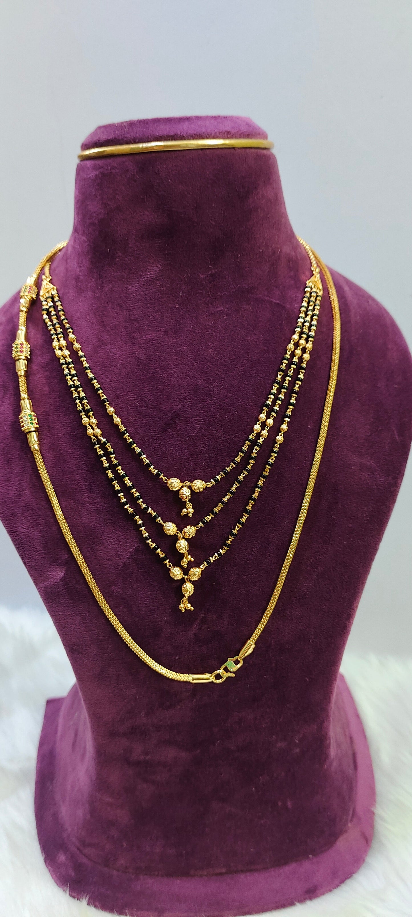 Micro gold plated 24 " length thali chain and 3 step black beads combo