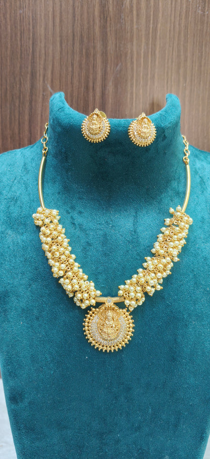 Simple and elegant pearl lakshmi Devi necklace set