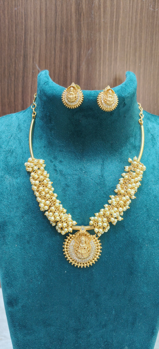 Simple and elegant pearl lakshmi Devi necklace set