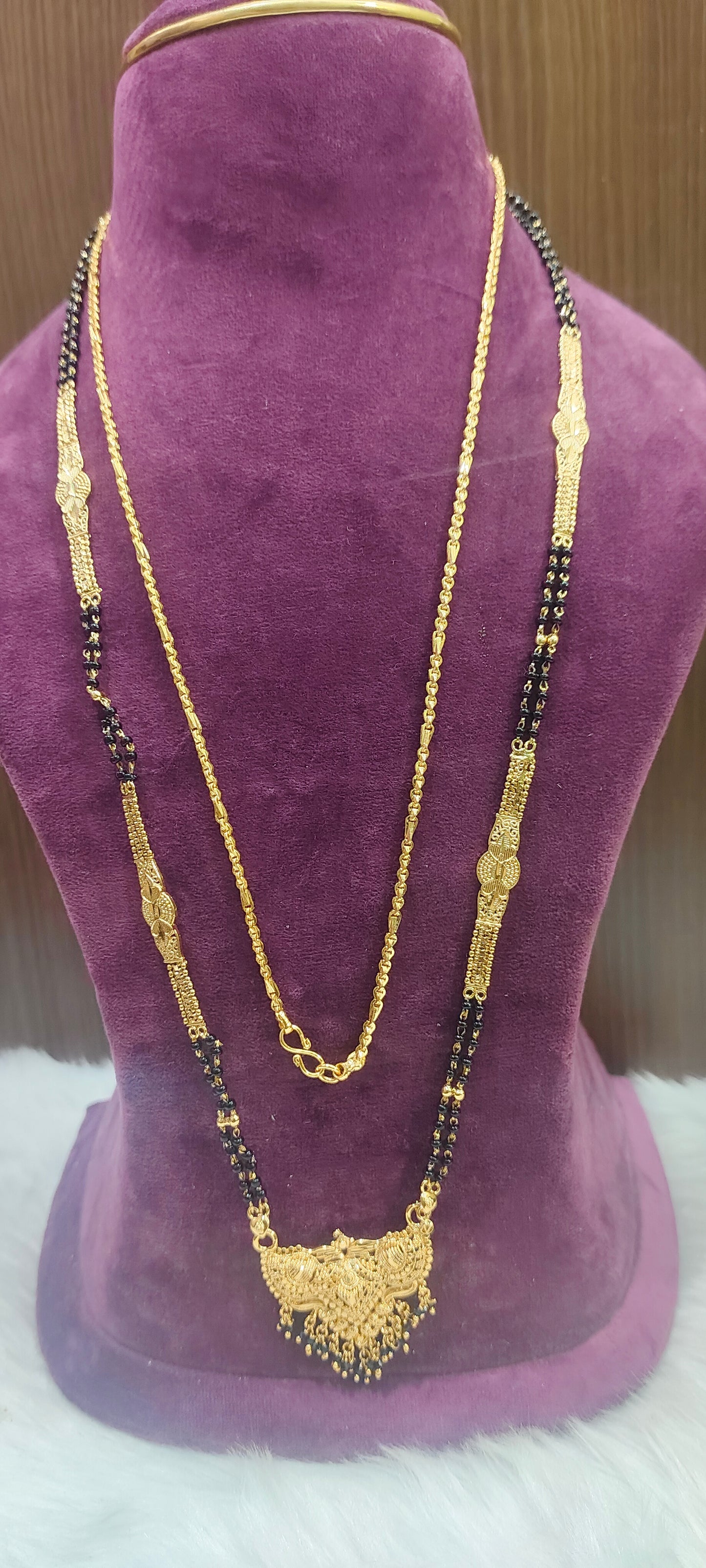 Premium gold look 4 set combo(28" length black beads,24"length thali chain, jumkas,vanki ring)