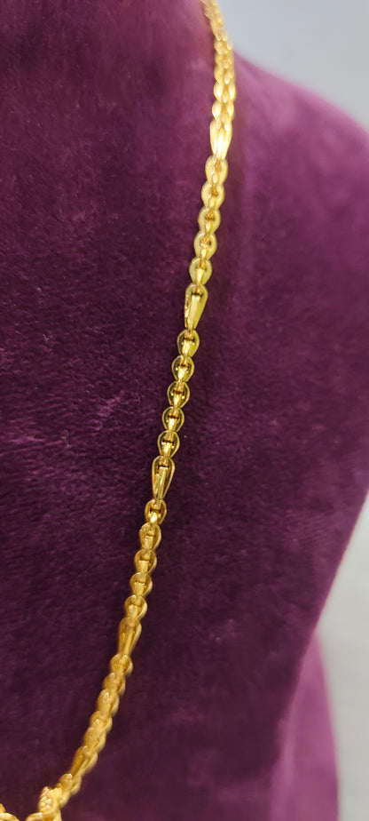 Same as gold om pendant with 20" length chain