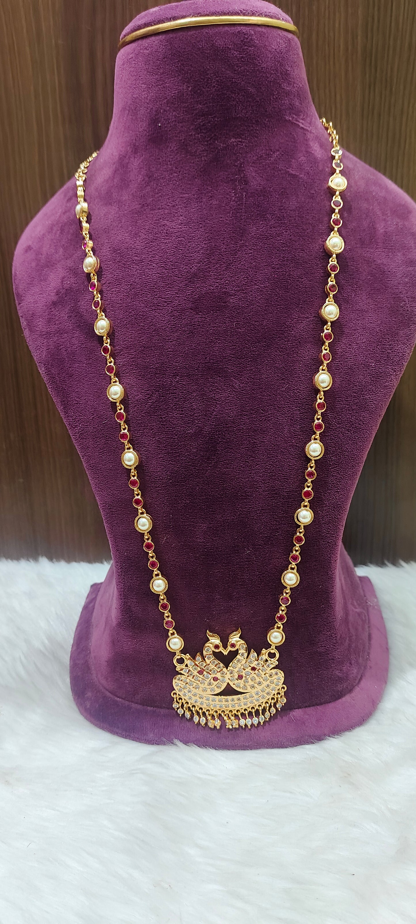 Pure panchaloham double swam pendent long haram with ruby stones