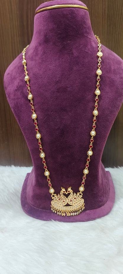 Pure panchaloham double swam pendent long haram with ruby stones