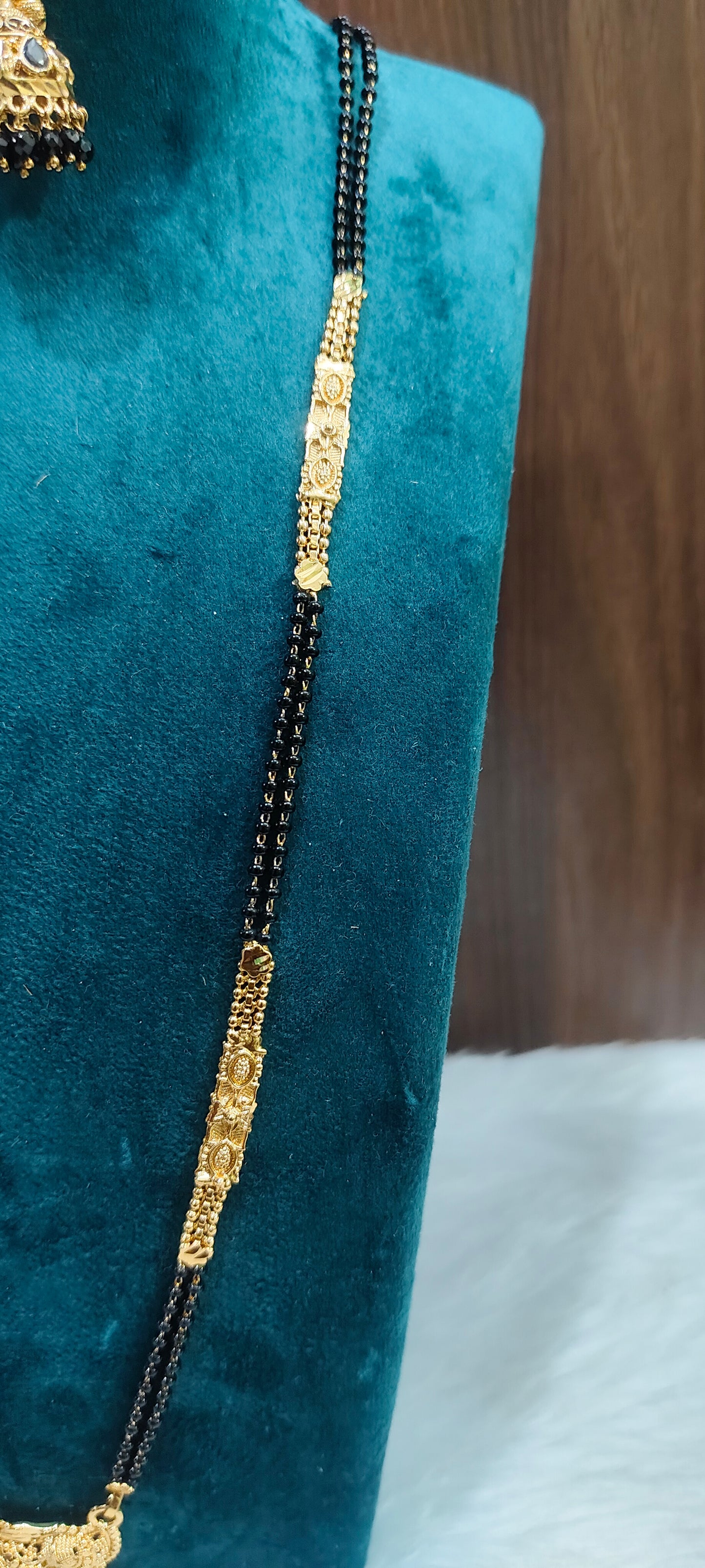 Premium gold look 3 set combo( black beads 28" length,jumkas, bangles)