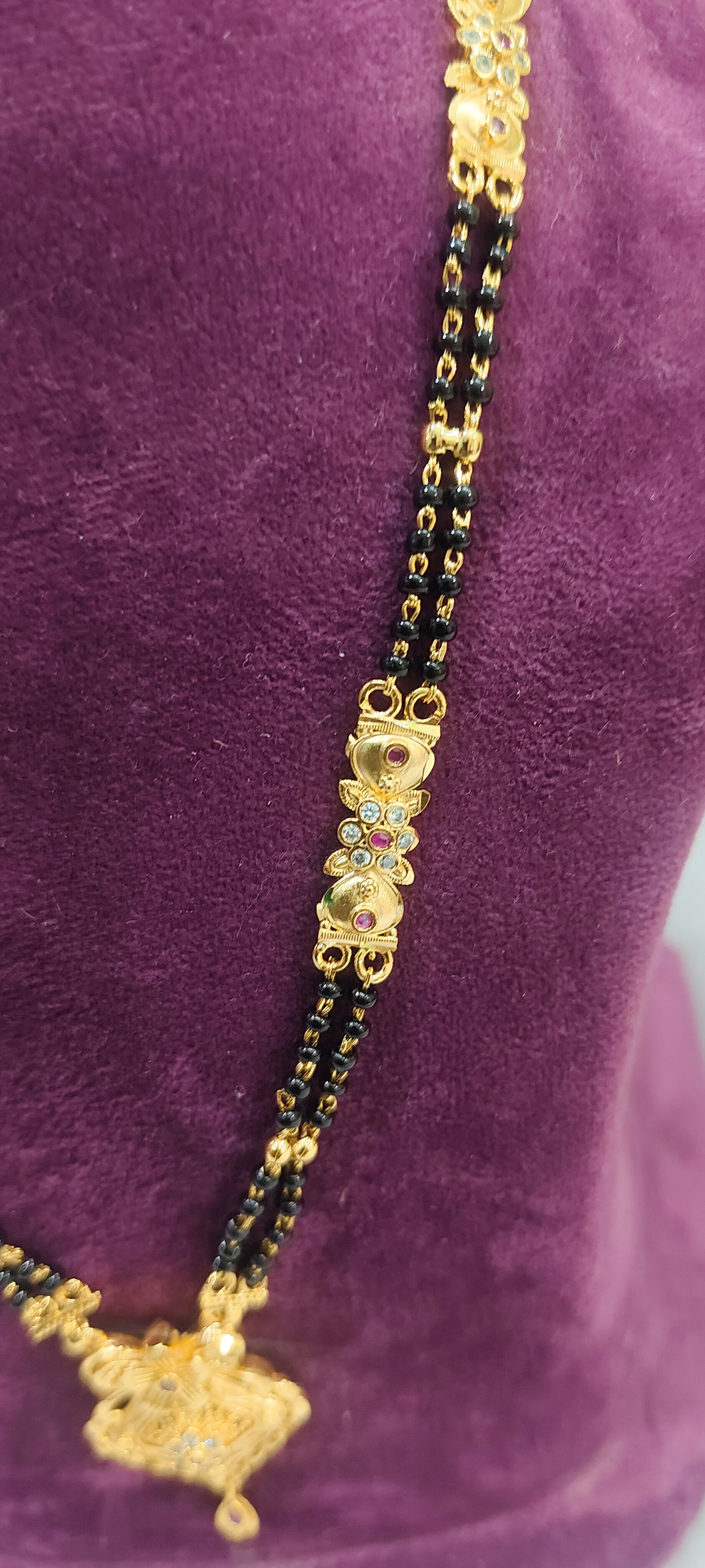 100% gold look 22" length 2 line black beads