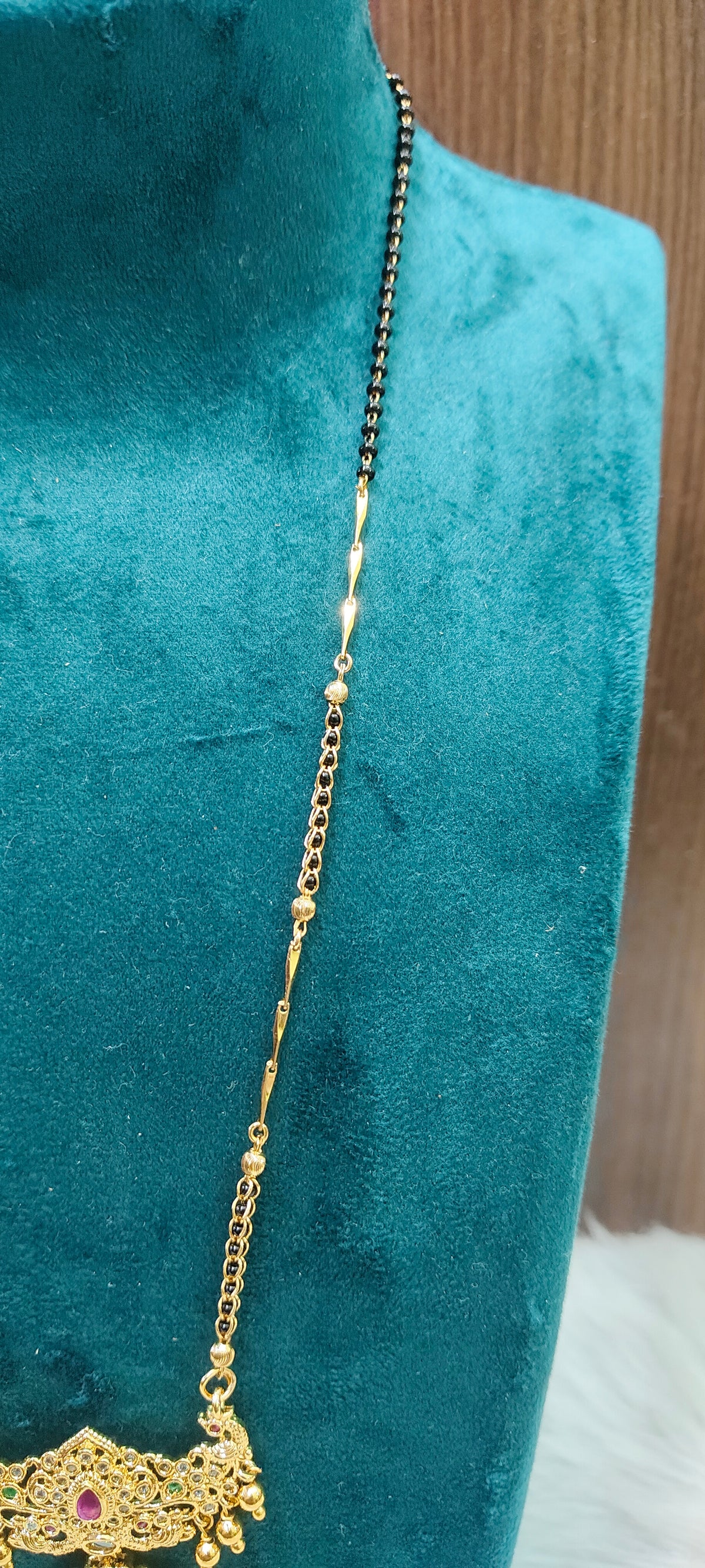 Premium gold look 20" length black beads ( chain design may changes)