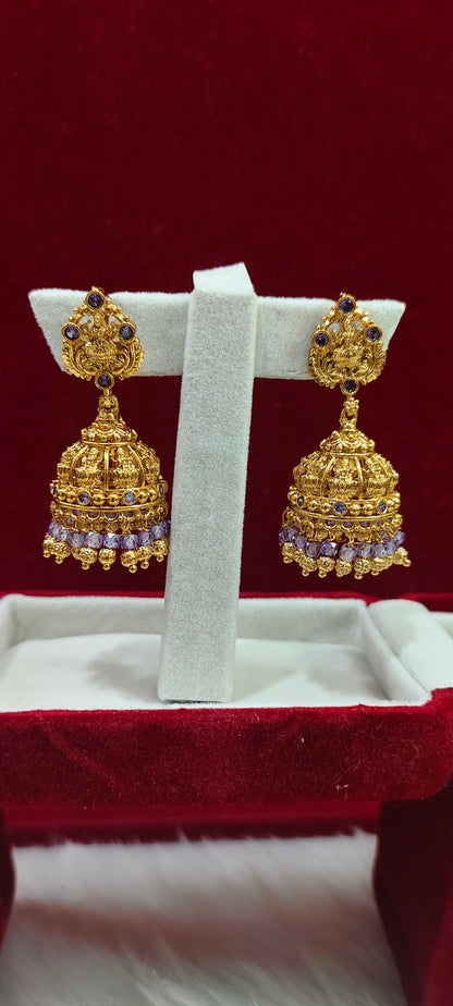 Premium gold look medium big size light violet colour Lakshmi Devi jumkas