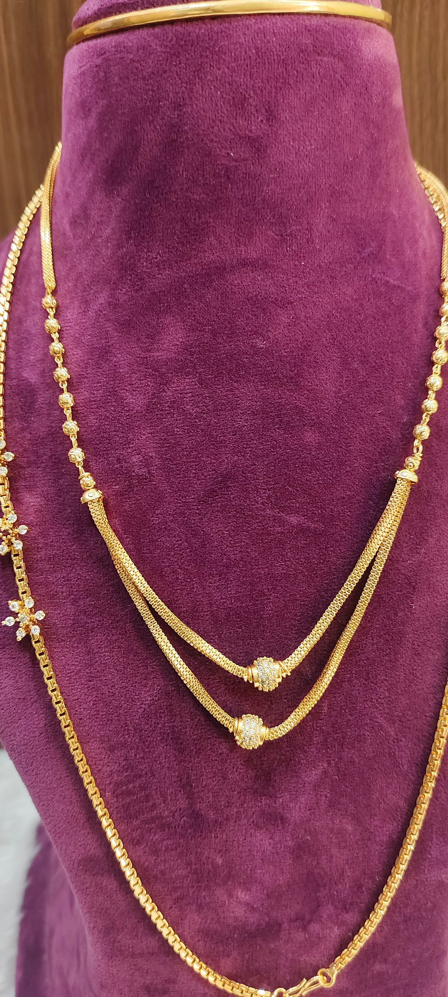 Premium micro gold plated 24" length thali chain and 18" length 2 step chain combo ( stone flower colour may changes in thali chain)
