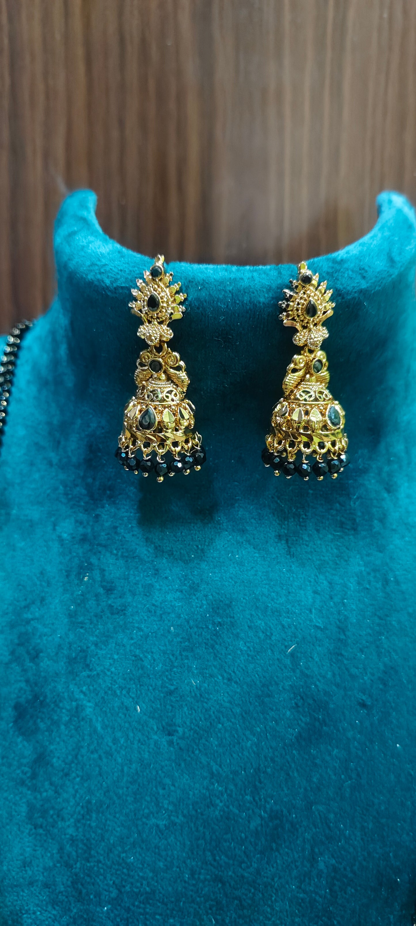 Premium gold look 3 set combo( black beads 28" length,jumkas, bangles)