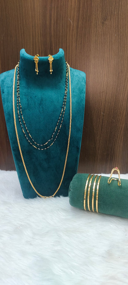 Premium micro gold plated daily wear 5 set combo(26" length thali chain,18" black beads, earrings,vanki ring, 4bangles)