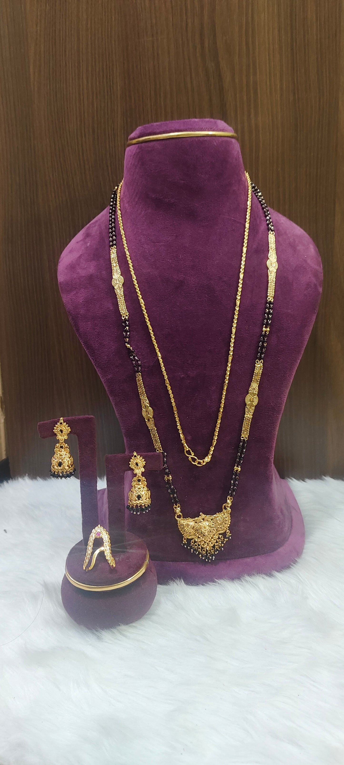 Premium gold look 4 set combo(28" length black beads,24"length thali chain, jumkas,vanki ring)